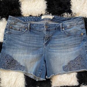 Torrid Denim cut off shorts with floral appliqué